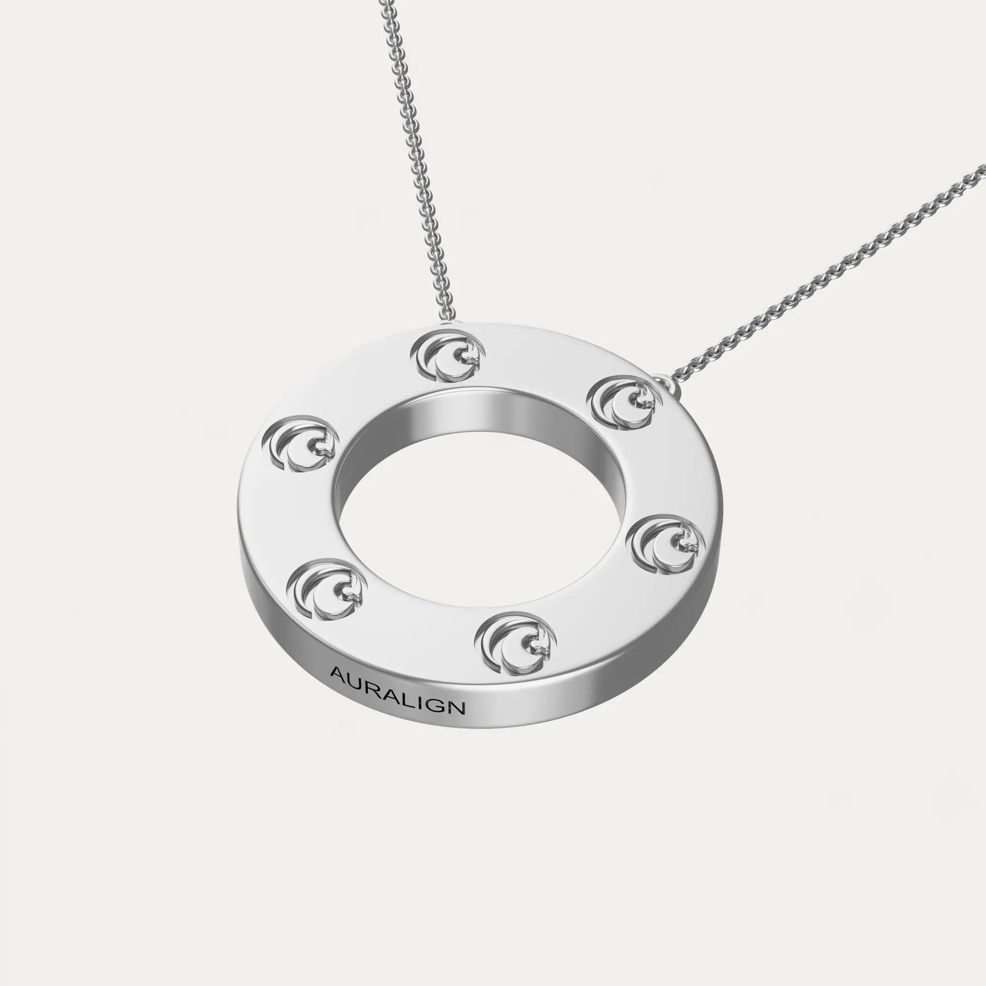 Close-up of a single green leaf against a white background.