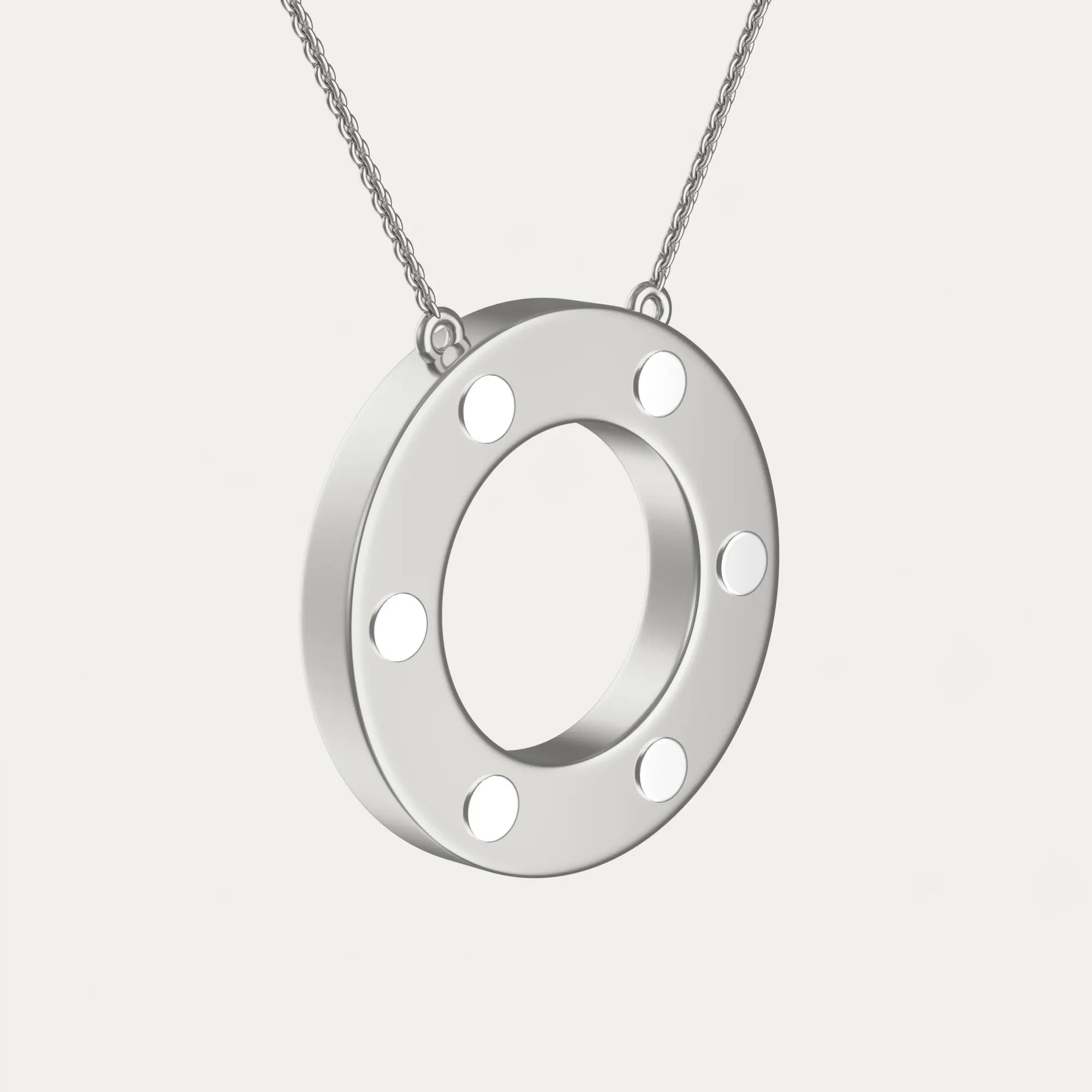 Close-up of a single green leaf against a white background.