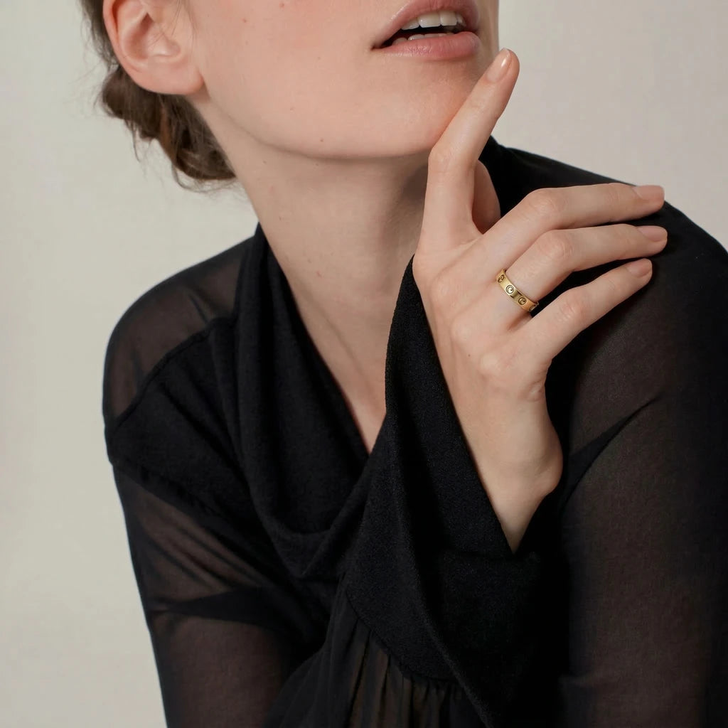 An AURALIGN ring, bracelet, necklace and earrings